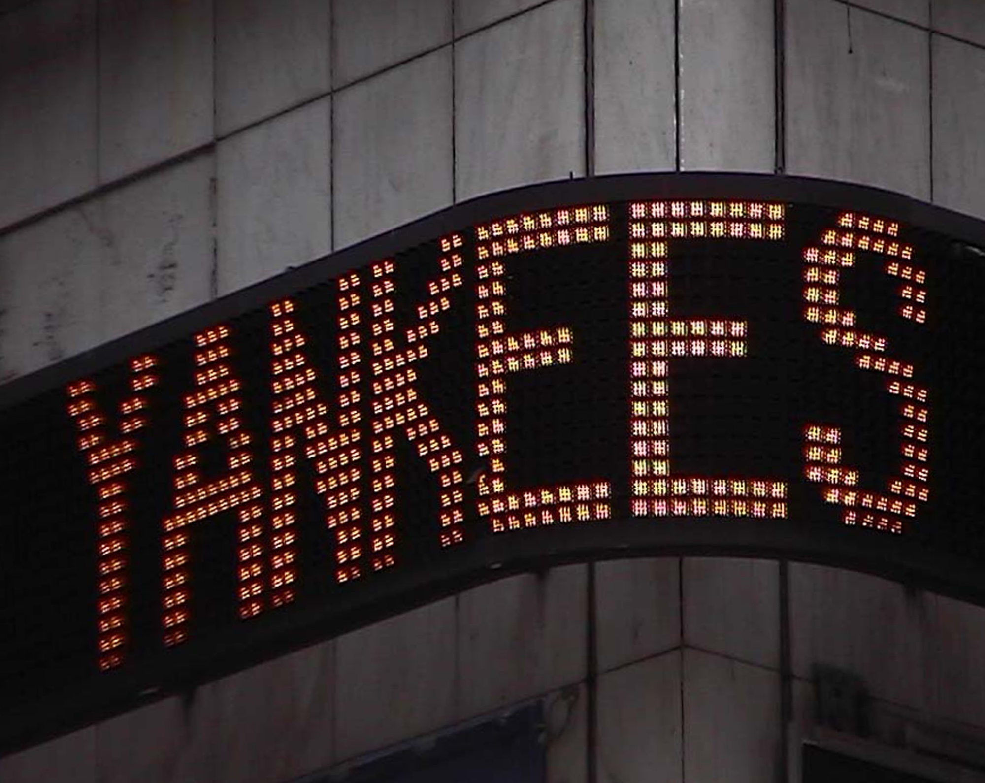 Yankees sign in lit bulbs on a building corner