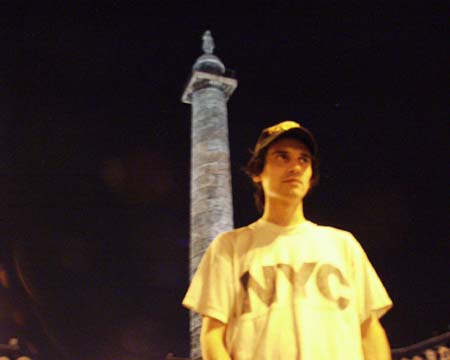 The young man below the Vendôme column against a black sky