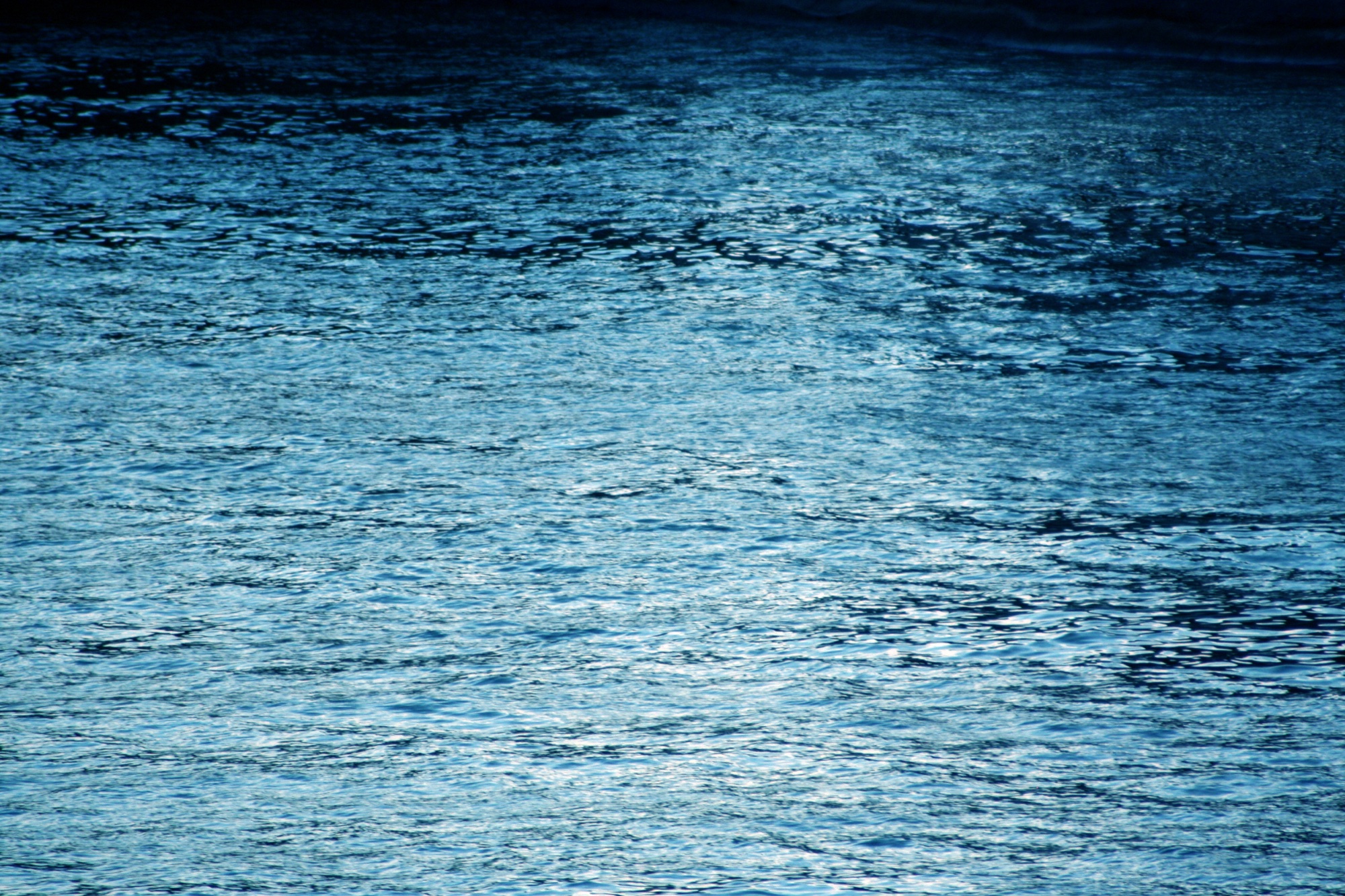 Deep blue water glittering