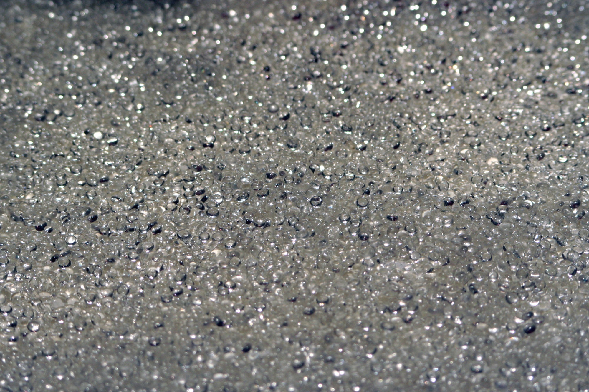 Grey asphalt flecked with glitter