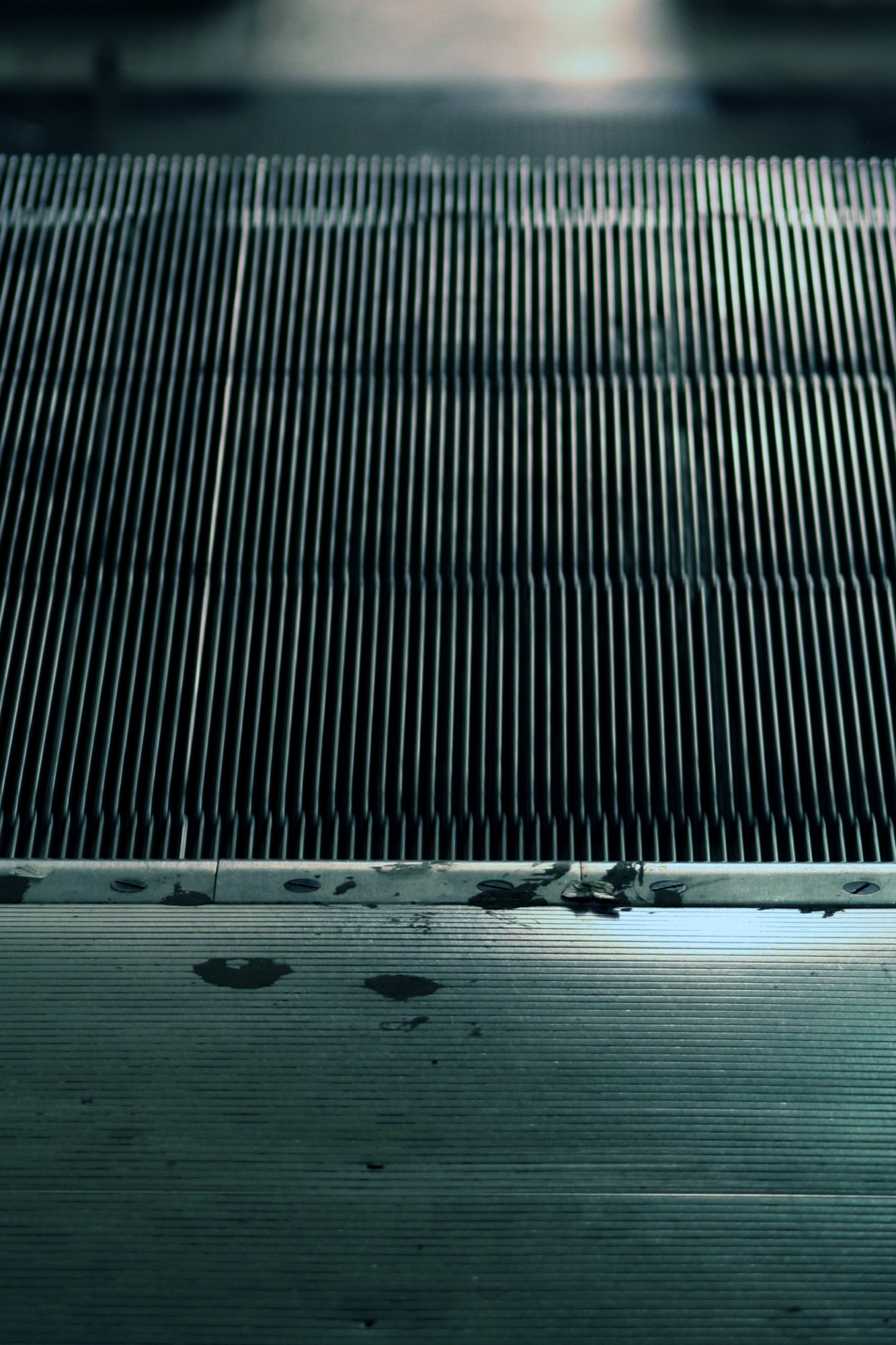 Steel grooves of an escalator step