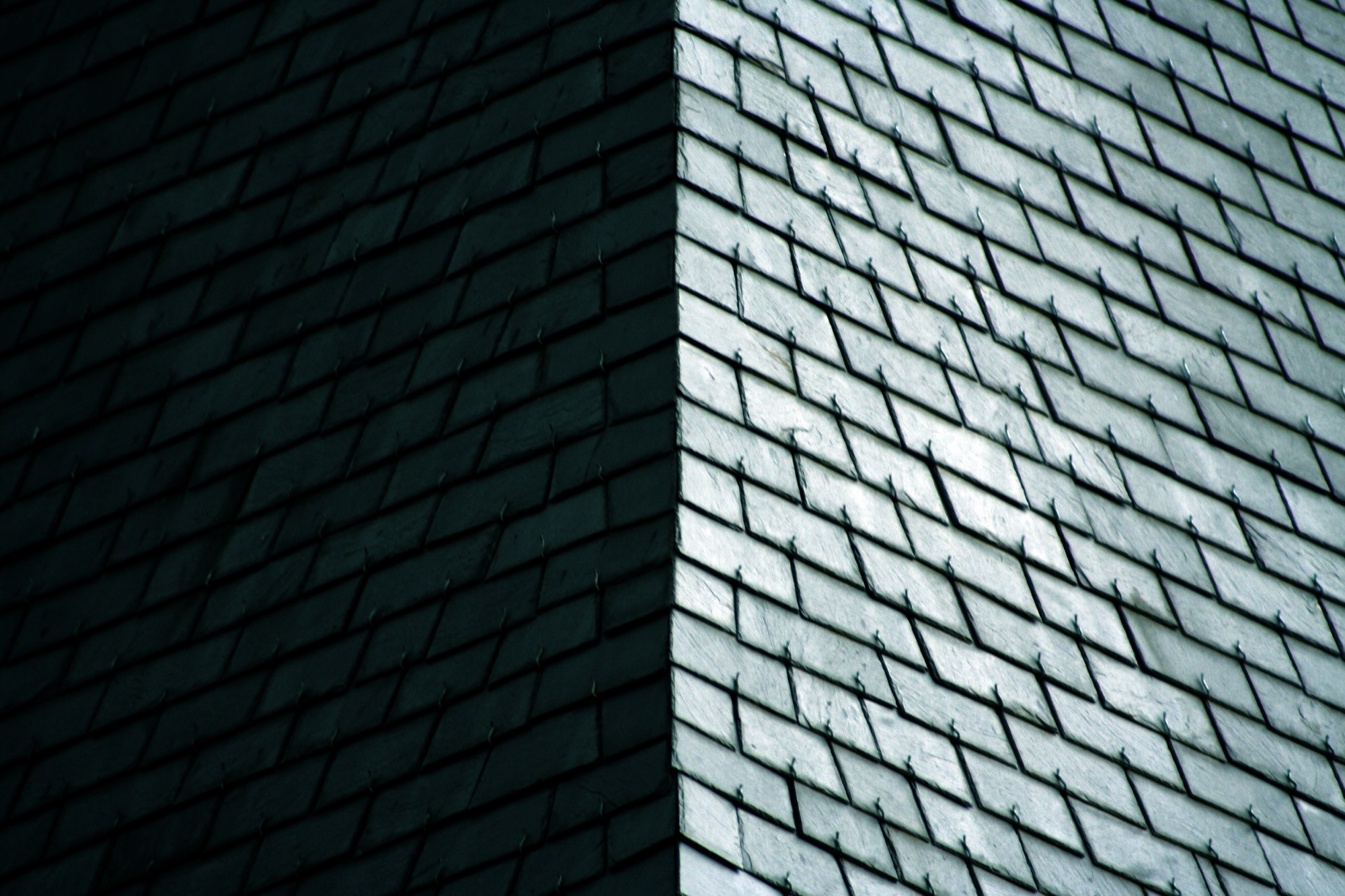 A slate-covered corner, one side lit